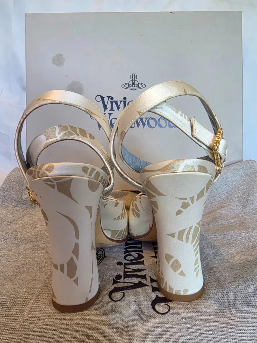 VIVIENNE WESTWOOD IVORY & GOLD PRINT PLATFORM ANKLE STRAP HEELS